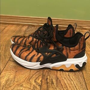 Nike Orange and Black Sneakers with Bold Design
